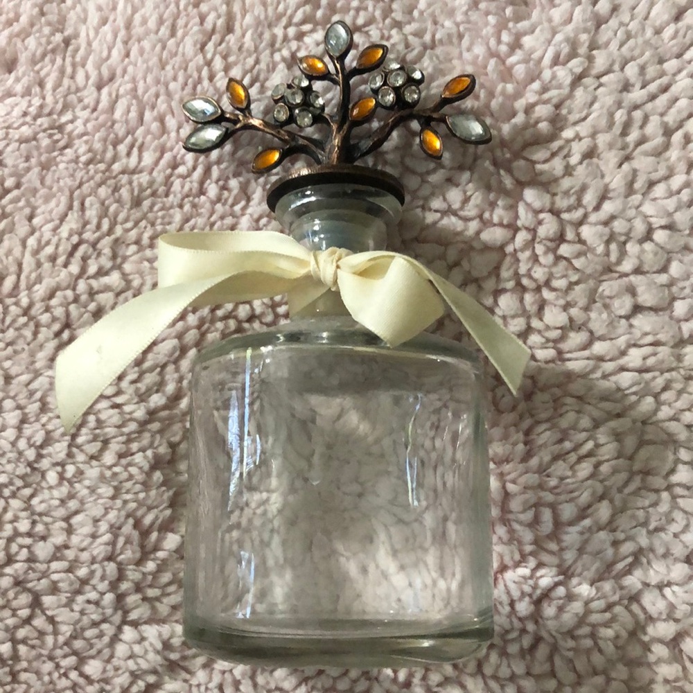 Small glass jar with beautiful filigree tree stopper with stones!